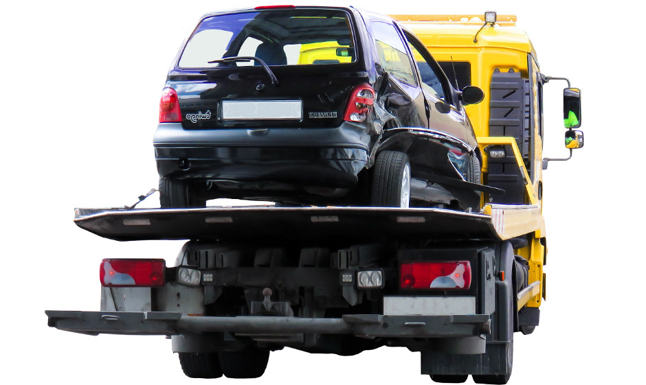 Yellow Flatbed Towing Truck with damaged black car on it. Yellow Flatbed Towing Truck with damaged black car on it.